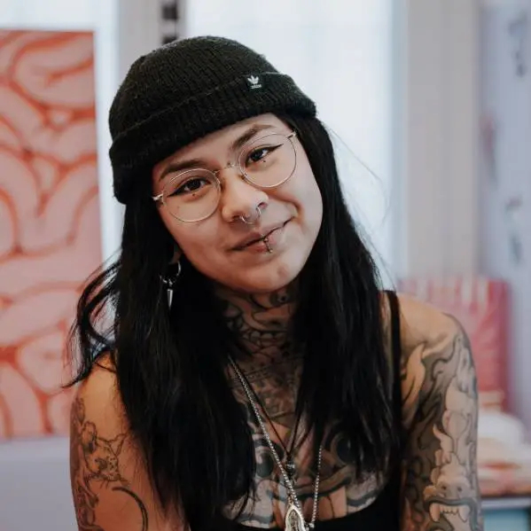 Portrait of Cozy, Tattoo Artist / Owner at Ragequit Tattoo Piercing Zurich